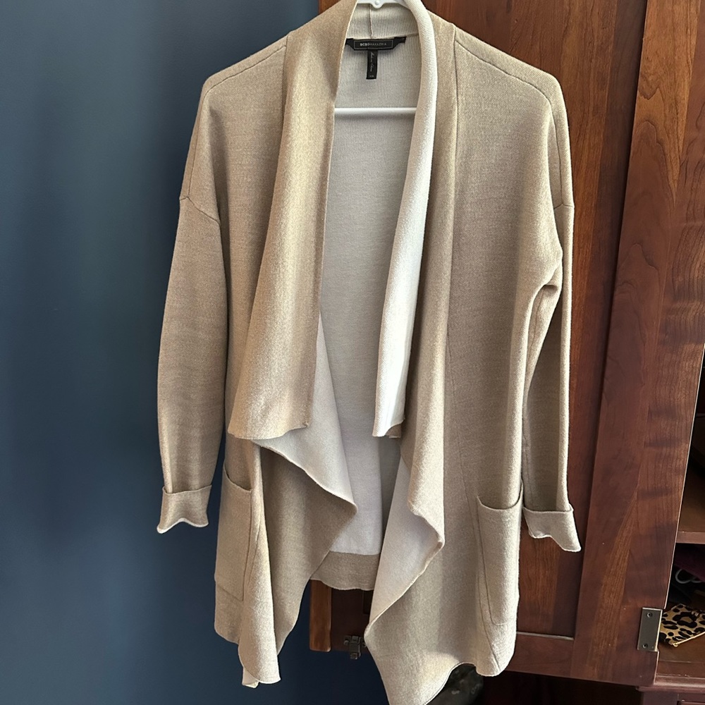 Bcbg wrap sweater size xs.  Good condition.  Small stain but cover-able